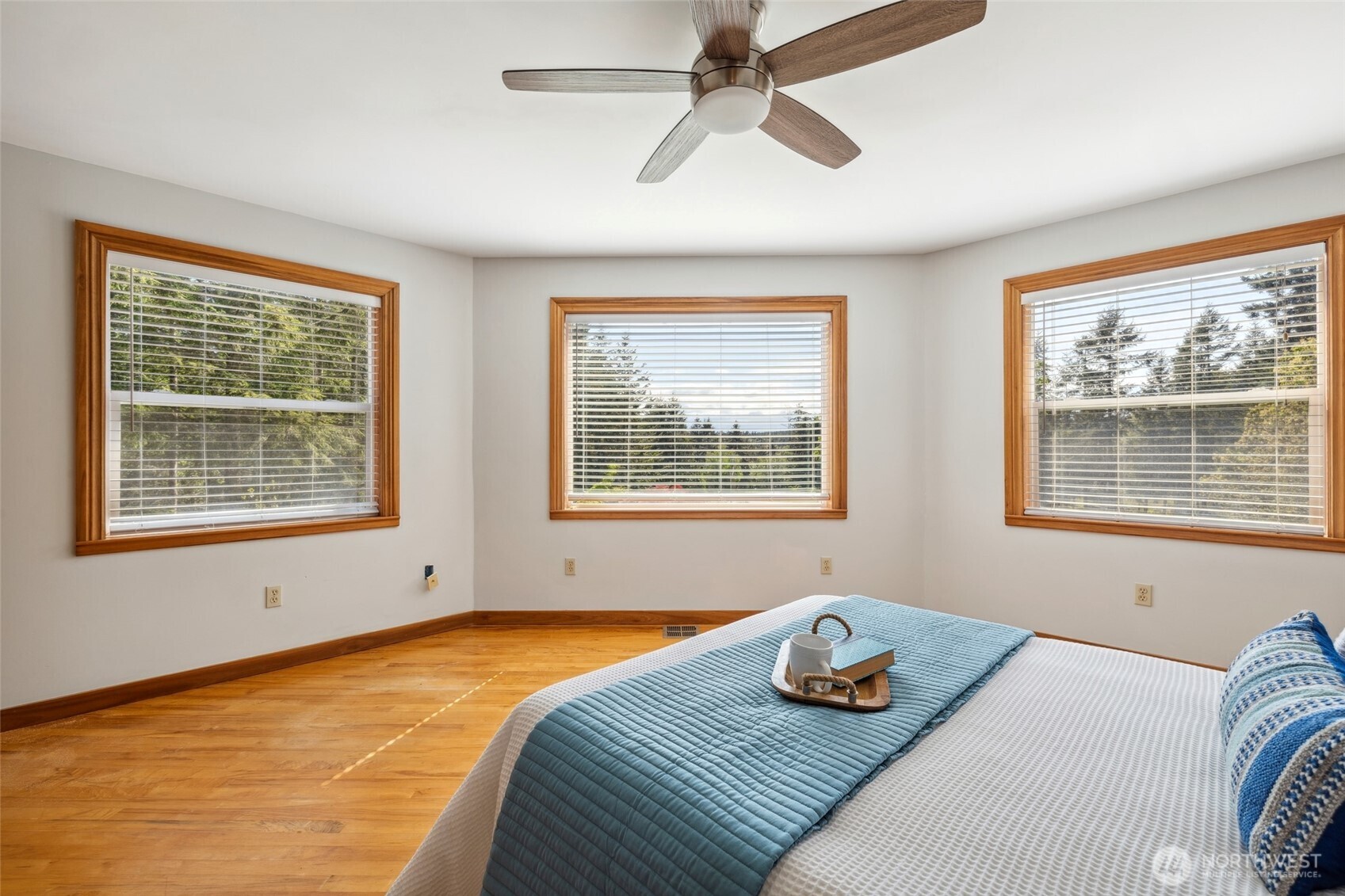 4987 Mutiny Bay Road Freeland, WA 98249 - Photo 18 of 40 a bedroom with a bed and window