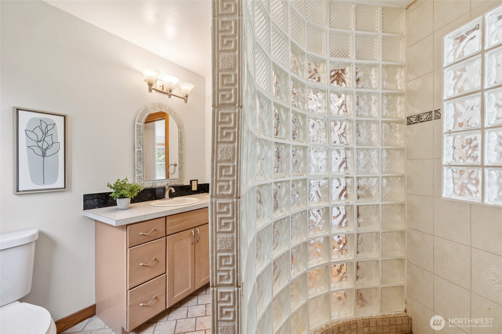4987 Mutiny Bay Road Freeland, WA 98249 - Photo 20 of 40 a bathroom with a sink toilet and shower
