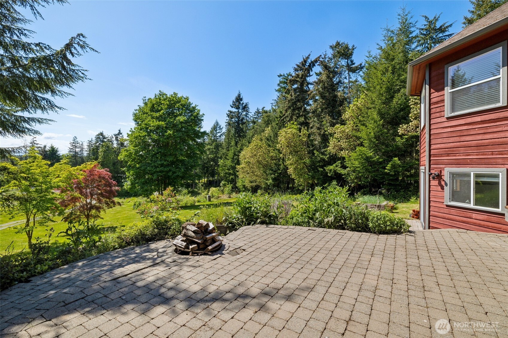 4987 Mutiny Bay Road Freeland, WA 98249 - Photo 30 of 40 a view of a backyard with sitting area