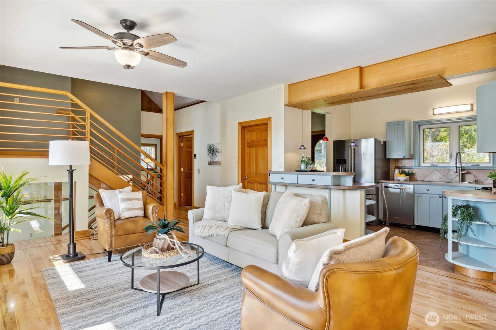 4987 Mutiny Bay Road Freeland, WA 98249 - Photo 8 of 40 a living room with furniture and wooden floor
