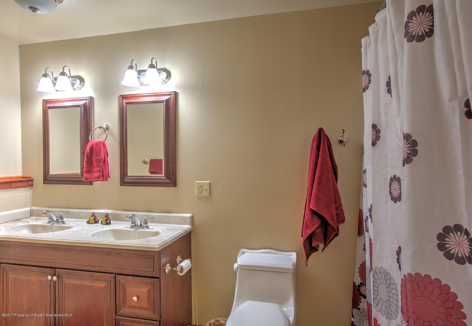 875 East 7th Street Rifle, CO 81650 - Photo 20 of 27 a bathroom with a sink and a mirror