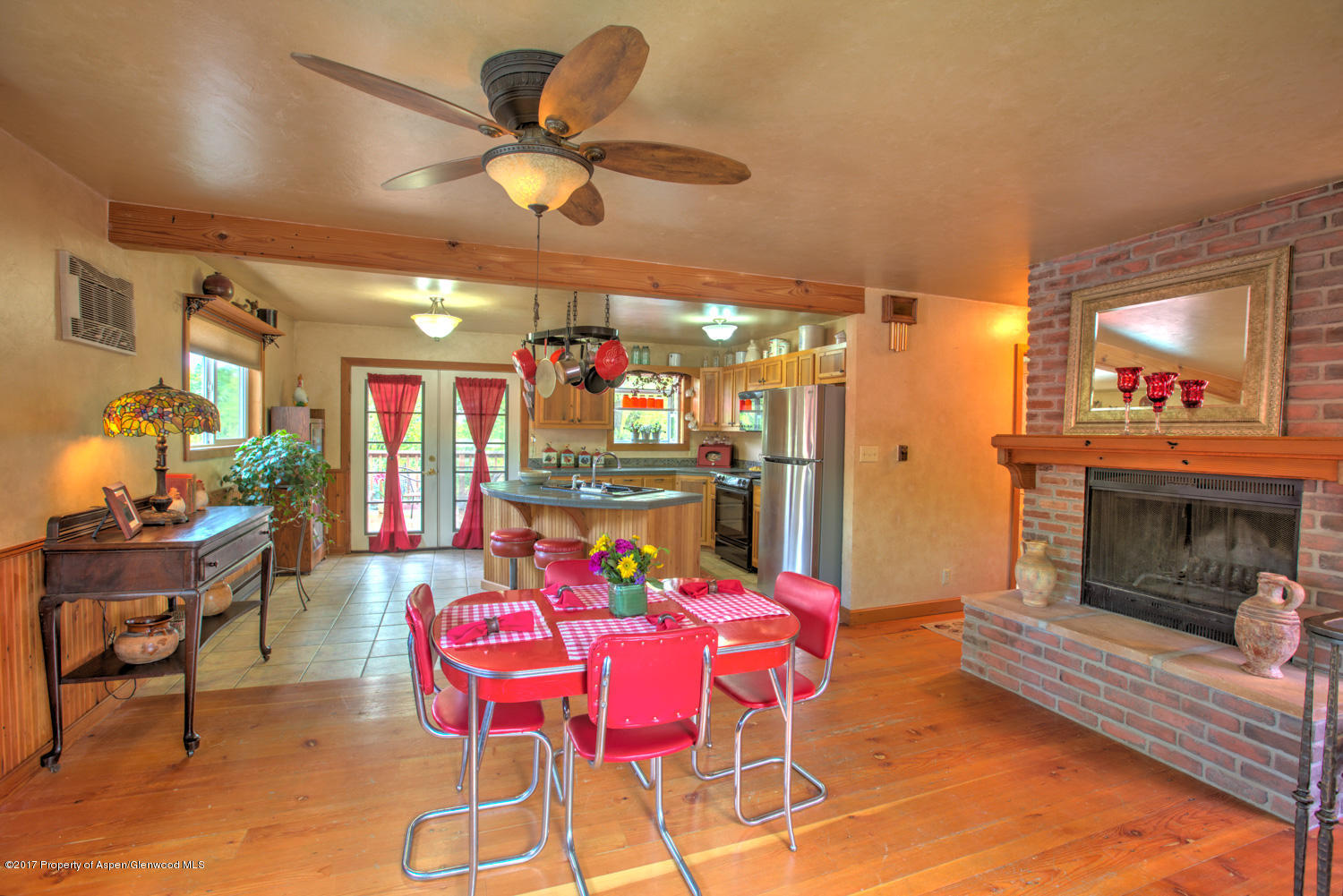 875 East 7th Street Rifle, CO 81650 - Photo 3 of 27 a view of a dining room with furniture and chandelier