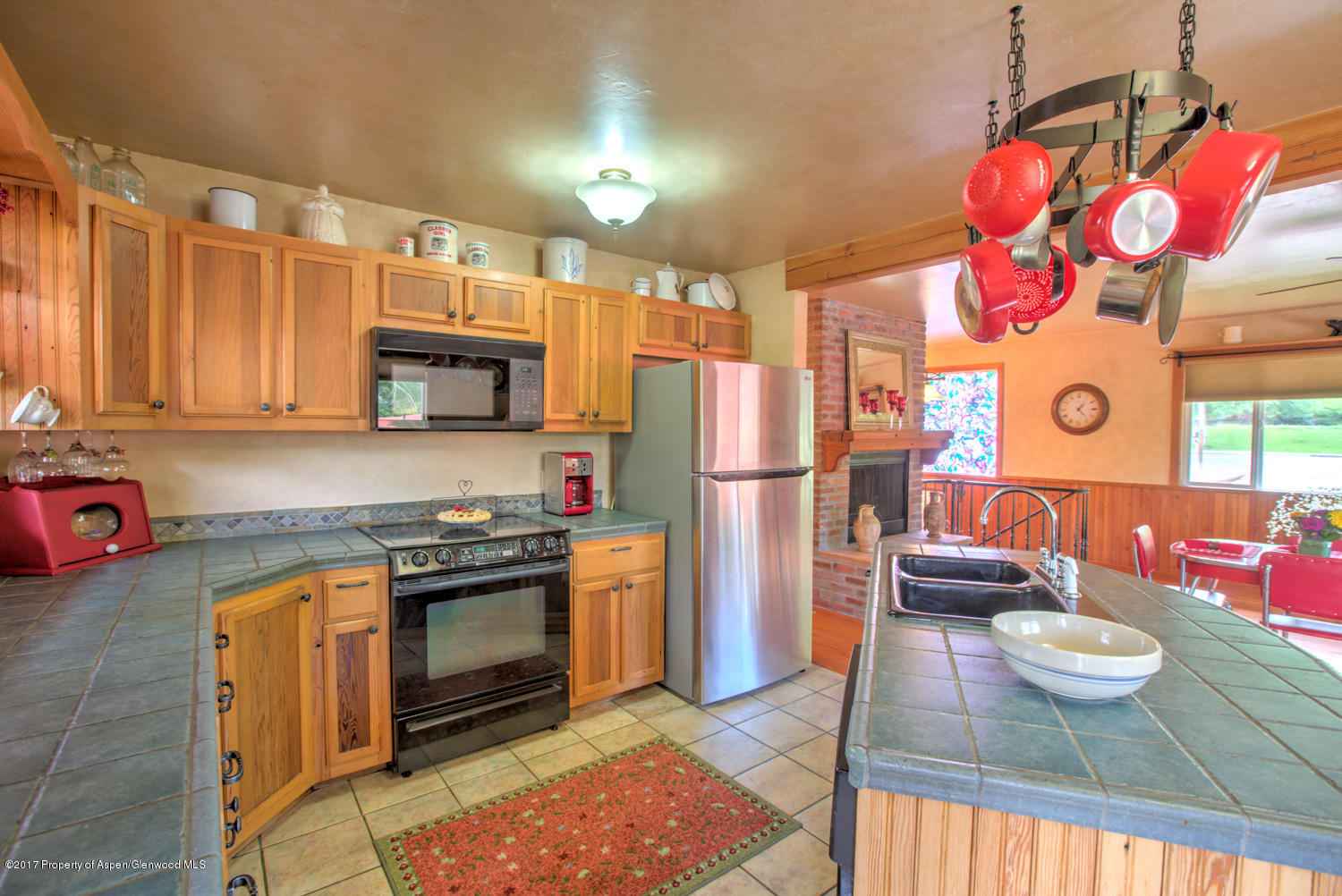 875 East 7th Street Rifle, CO 81650 - Photo 8 of 27 a kitchen with cabinets and appliances