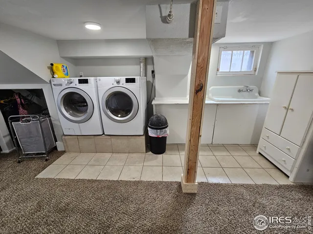 a bathroom with a toilet and a shower curtain