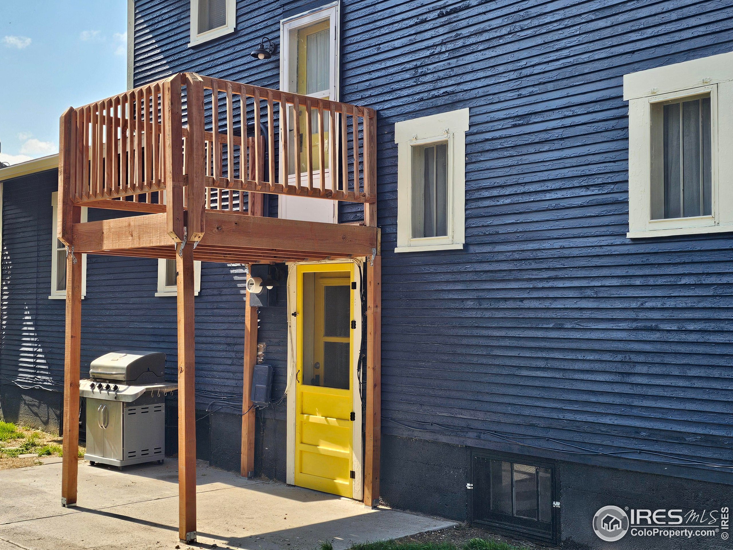 704 South 3rd Avenue Sterling, CO 80751 - Photo 32 of 35 a building view with a glass door