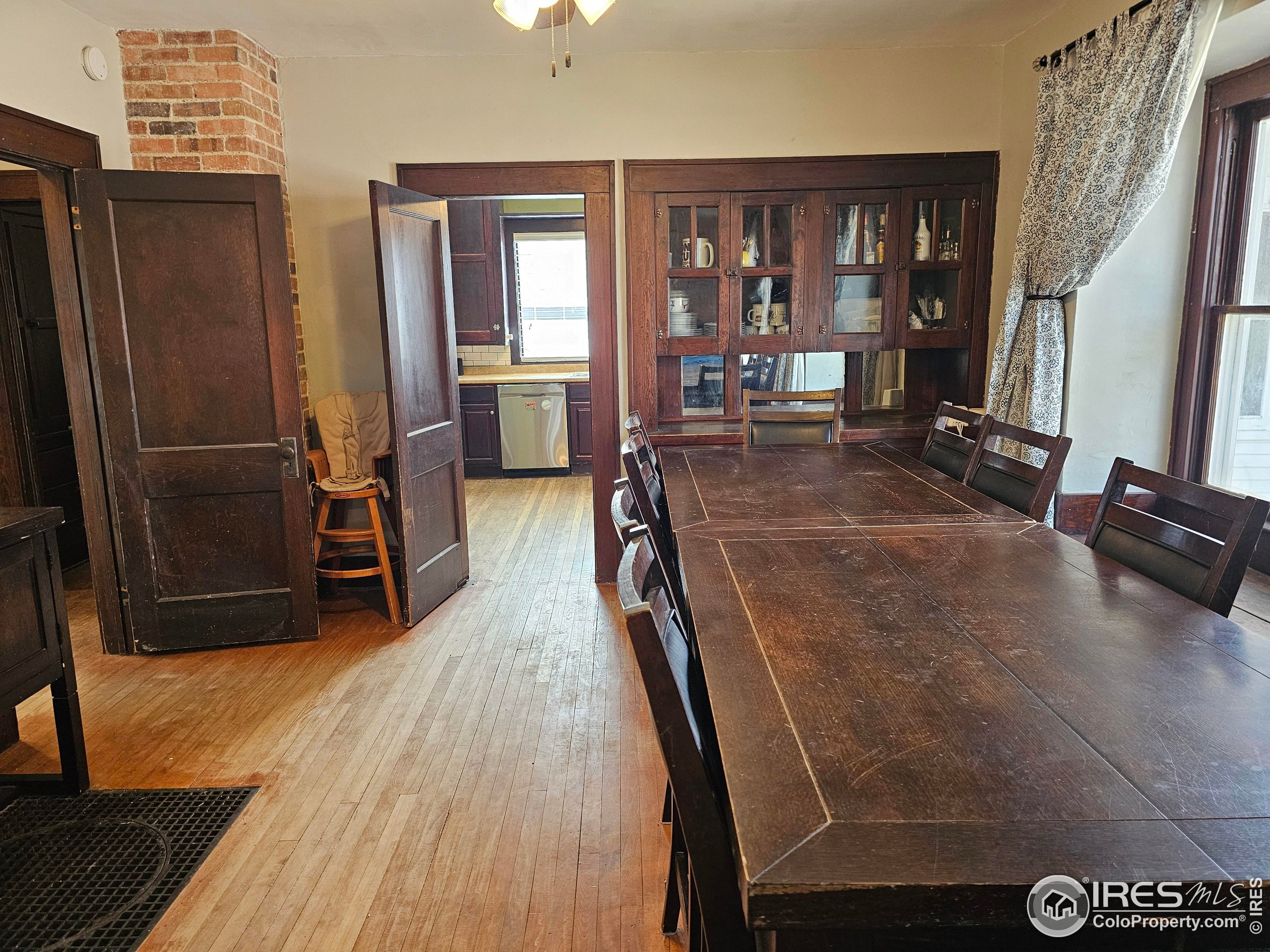 704 South 3rd Avenue Sterling, CO 80751 - Photo 5 of 35 a view of a room with gym equipment