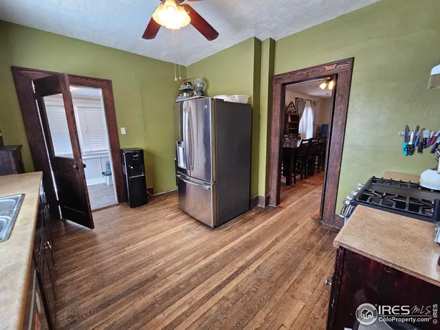 a view of a kitchen from the closet