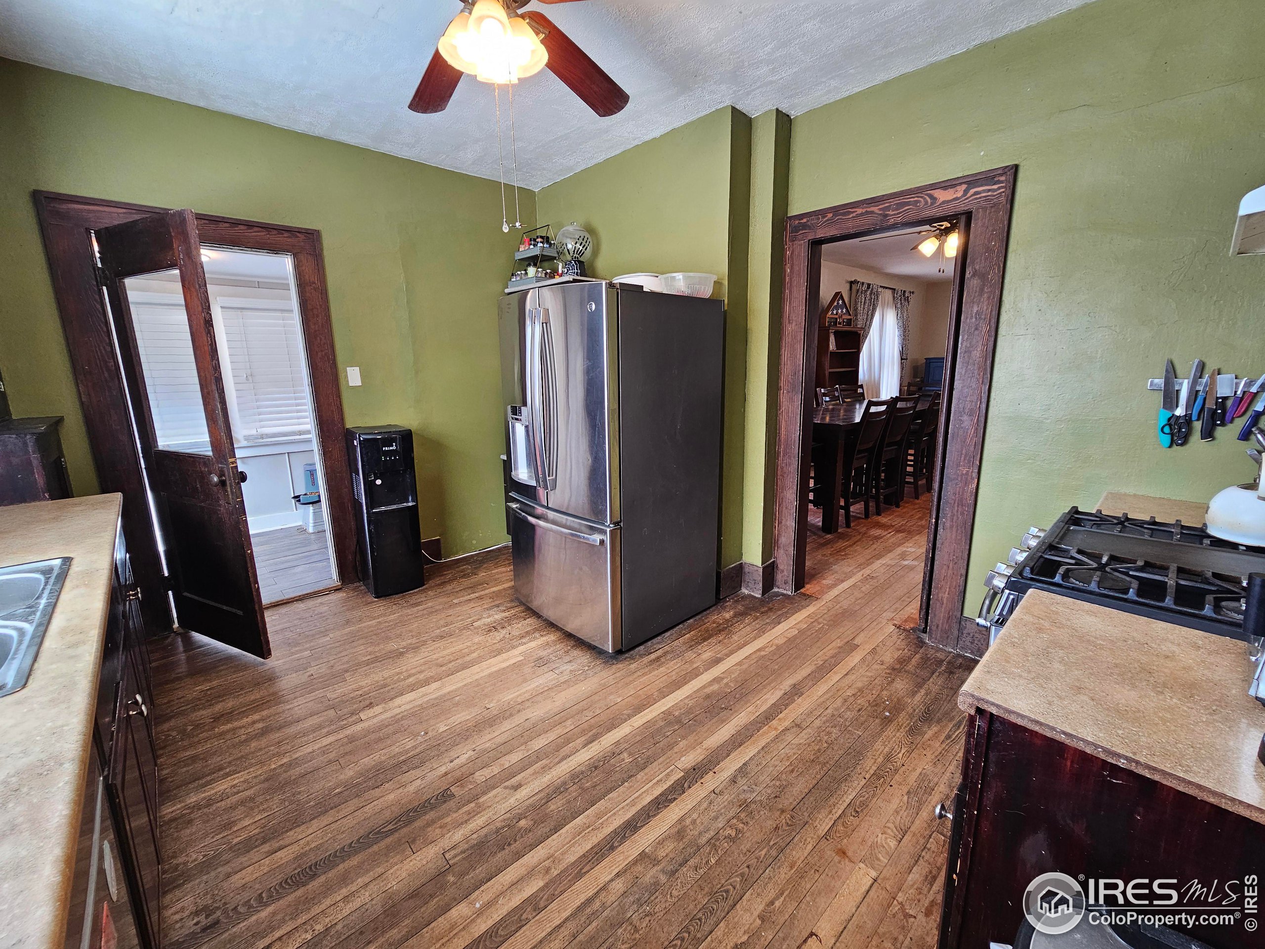 704 South 3rd Avenue Sterling, CO 80751 - Photo 10 of 35 a view of a kitchen from the closet