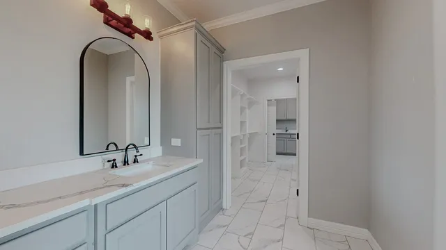 a view of an empty walk in closet