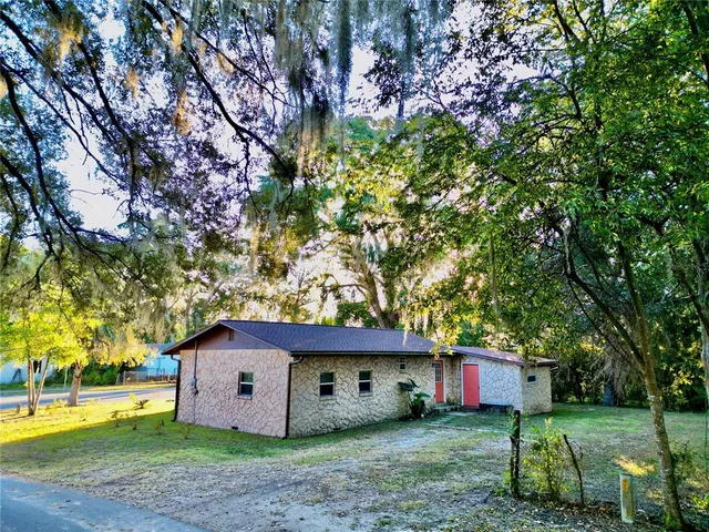 a view of a barn with a yard