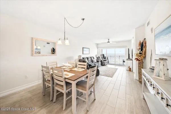 a view of a dining room with furniture
