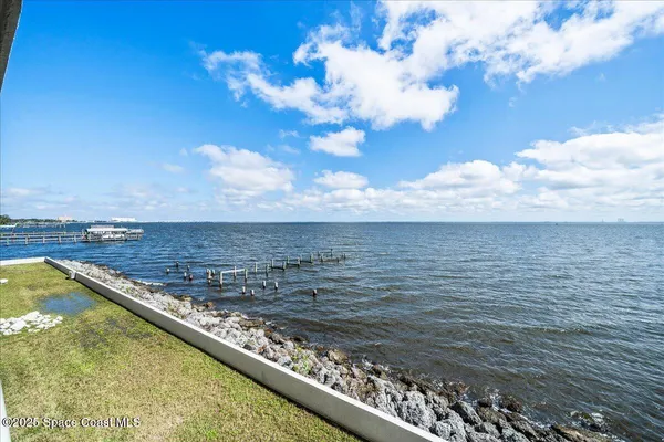 a view of an ocean from a balcony