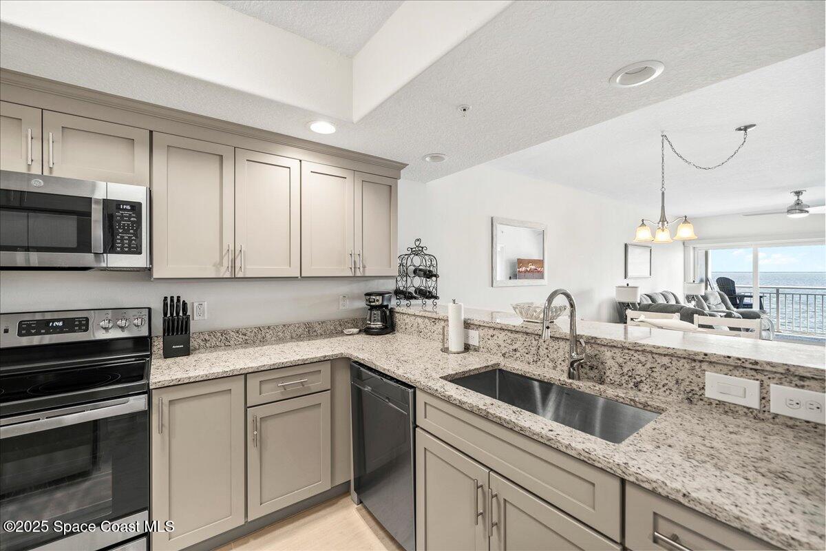 1805 Riverside Drive, Unit 206 Titusville, FL 32780 - Photo 9 of 51 Kitchen 3