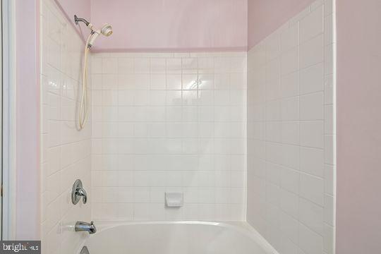 9511 Kingscroft Terrace, Unit 9511F Perry Hall, MD 21128 - Photo 37 of 38 a bathroom with a bathtub