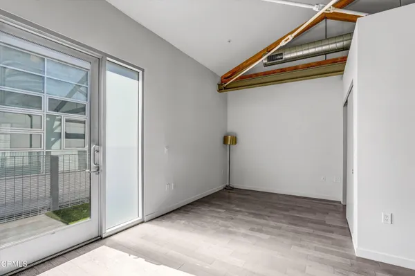 a view of livingroom with furniture and floor to ceiling window