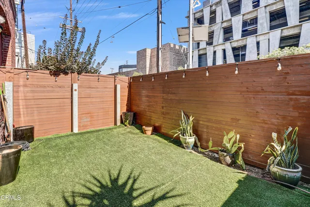 a backyard of a house with seating space