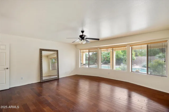 a bathroom with a sink a mirror and a shower