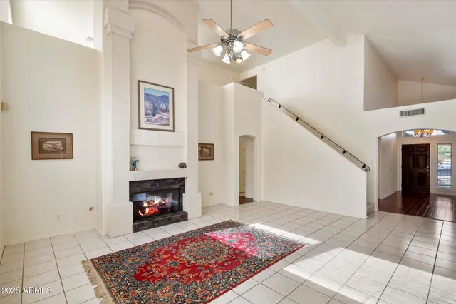 a view of livingroom with furniture wooden floor and windows