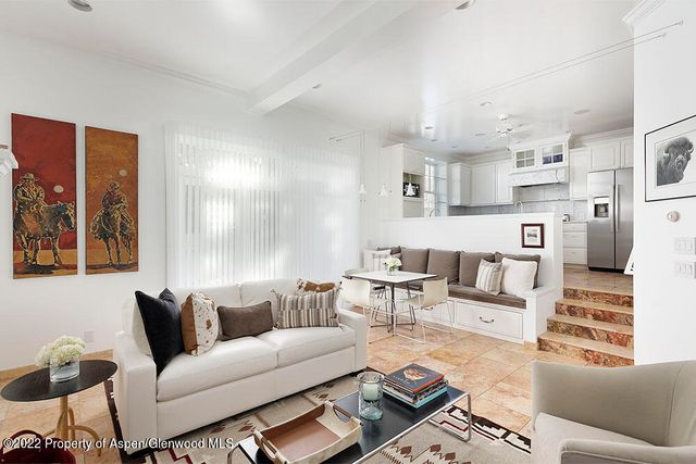 a living room with furniture and a couch