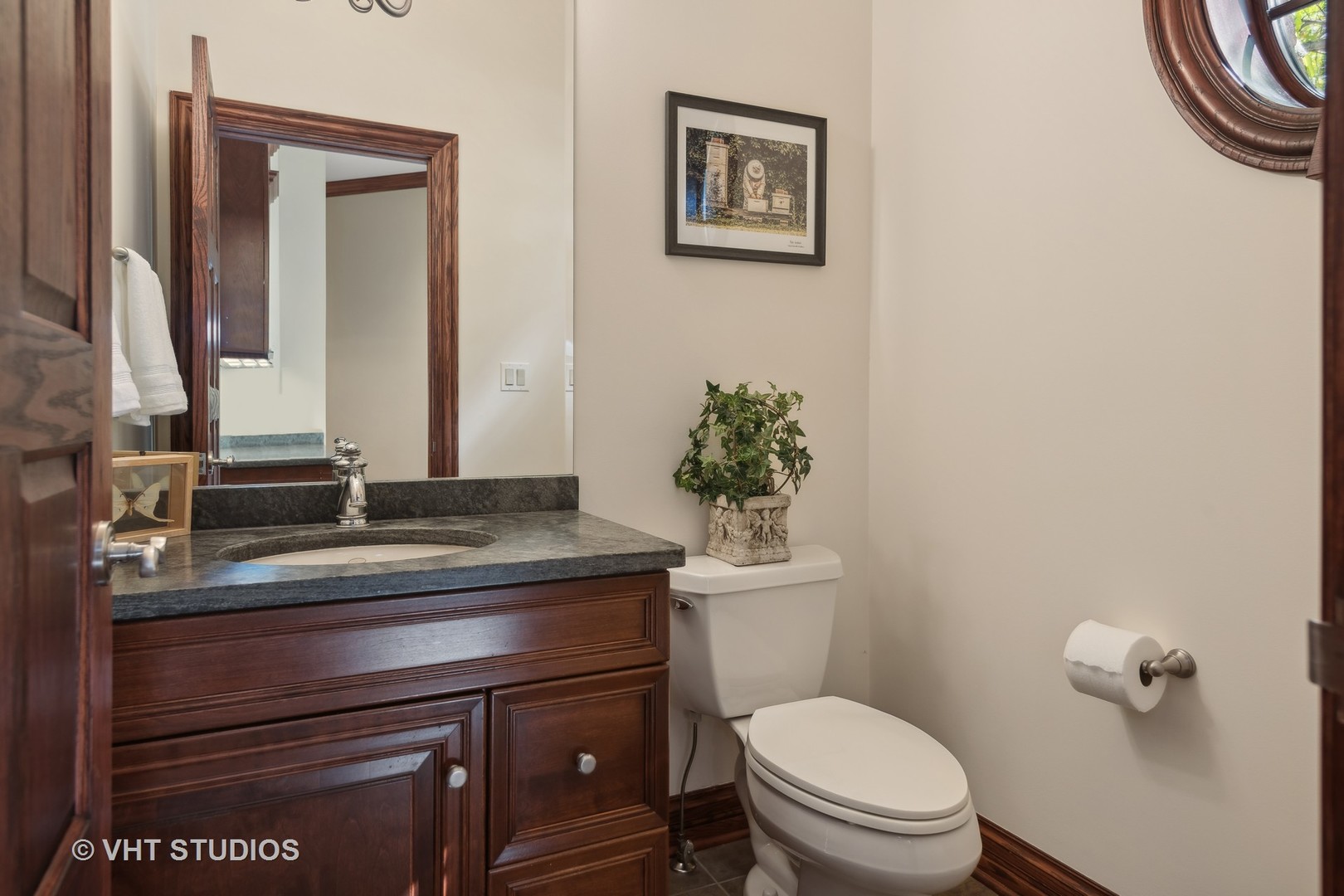 5 Porter School Road Barrington, IL 60010 - Photo 34 of 79 a bathroom with a toilet a sink and mirror
