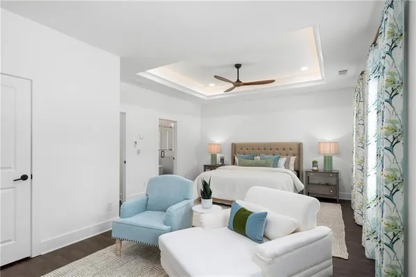 a bathroom with a double vanity sink toilet tub and shower