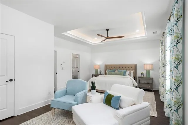 a bathroom with a double vanity sink toilet tub and shower