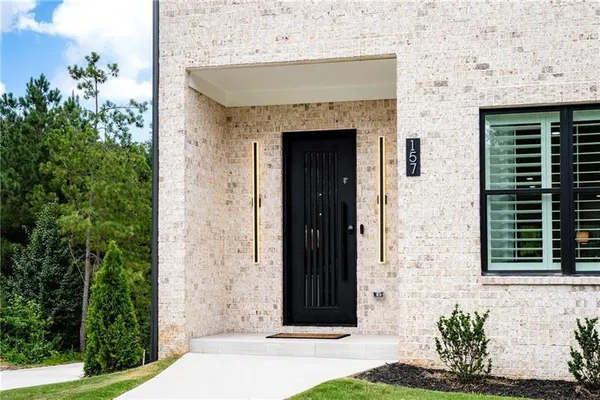 a front view of a house with a garage