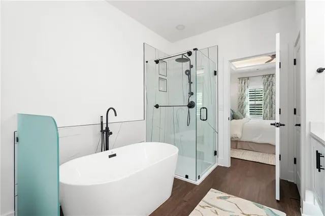 a bathroom with a sink a toilet and a shower curtain