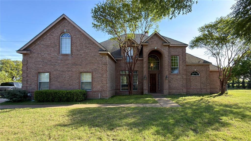 4303 Willow Ridge Drive Parker, TX 75002 - Photo 1 of 20 Traditional-style home featuring brick siding and a expansive front yard