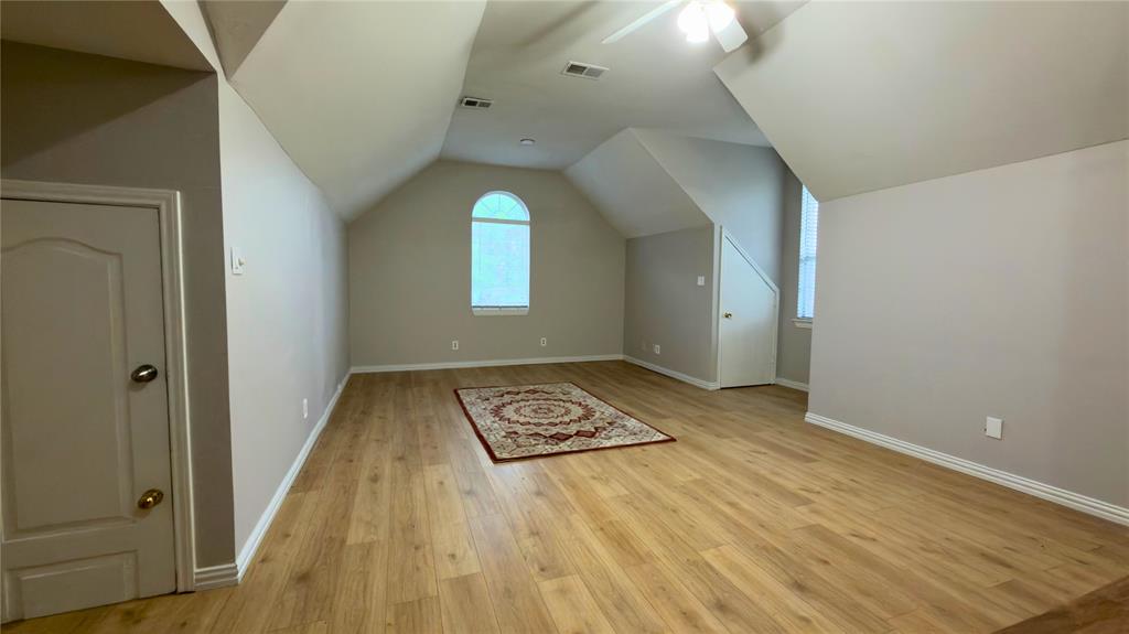 4303 Willow Ridge Drive Parker, TX 75002 - Photo 18 of 20 Bonus room featuring light wood-type flooring, lofted ceiling, and a ceiling fan
