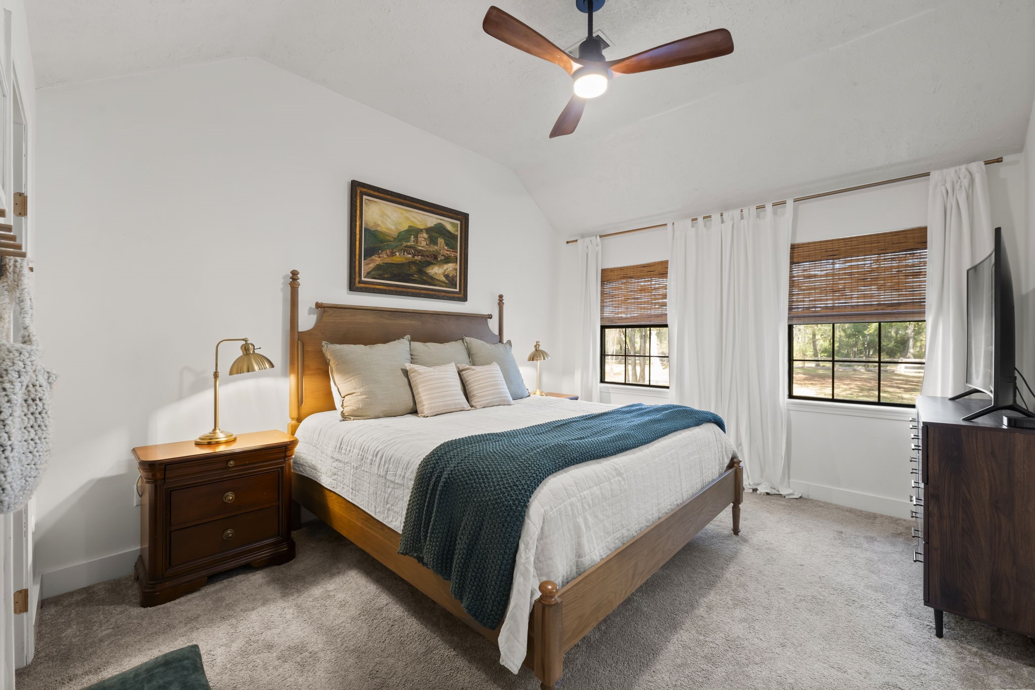 8623 Miller Road Magnolia, TX 77354 - Photo 15 of 44 a bedroom with a bed and a window