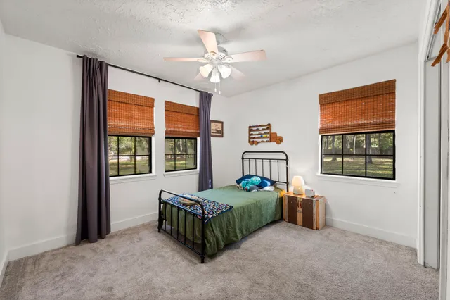 a view of house with outdoor space