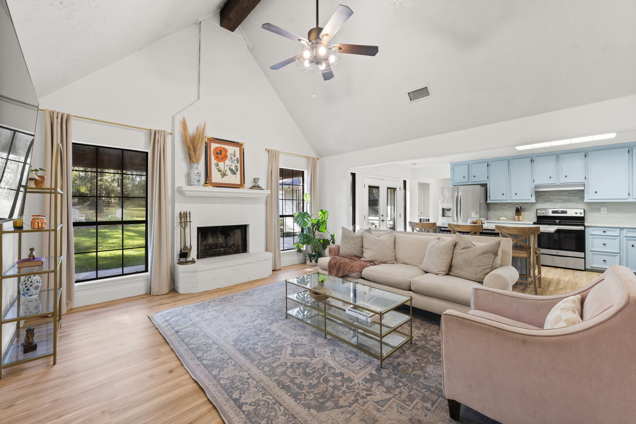 8623 Miller Road Magnolia, TX 77354 - Photo 6 of 44 a living room with furniture and a fireplace