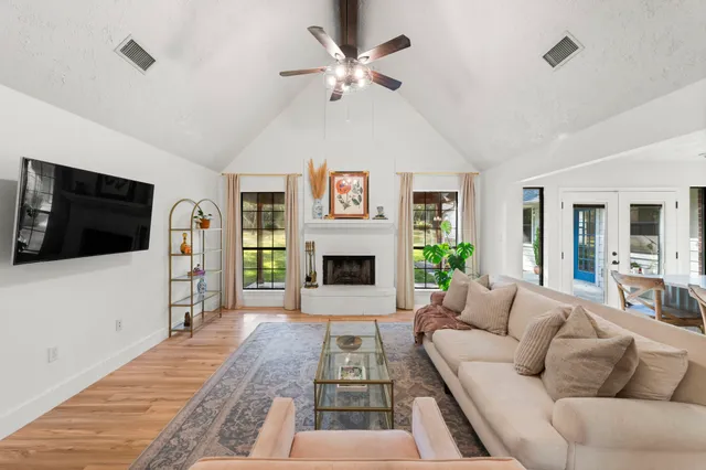 a kitchen with stainless steel appliances a refrigerator and a stove top oven