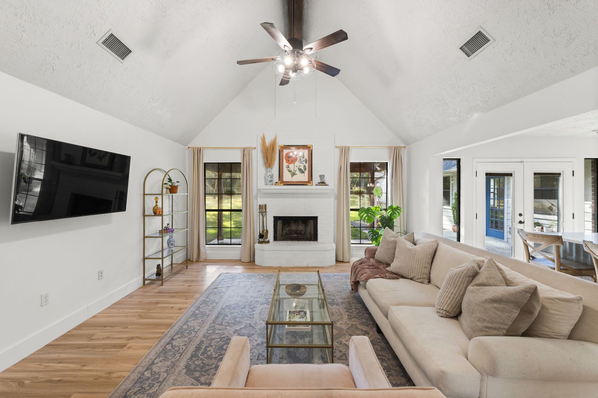 8623 Miller Road Magnolia, TX 77354 - Photo 9 of 44 a living room with furniture fireplace and flat screen tv