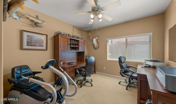 a living room with furniture and a window