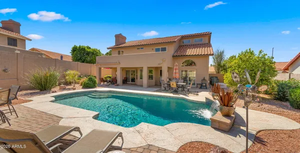 a picture of a room with a white wall and white cabinet