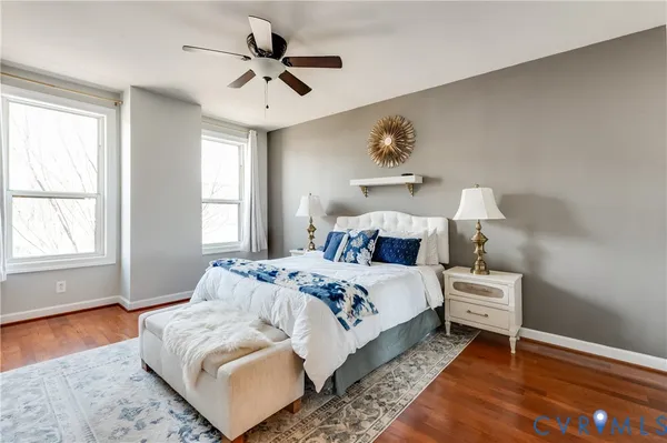 a bedroom with bed and window