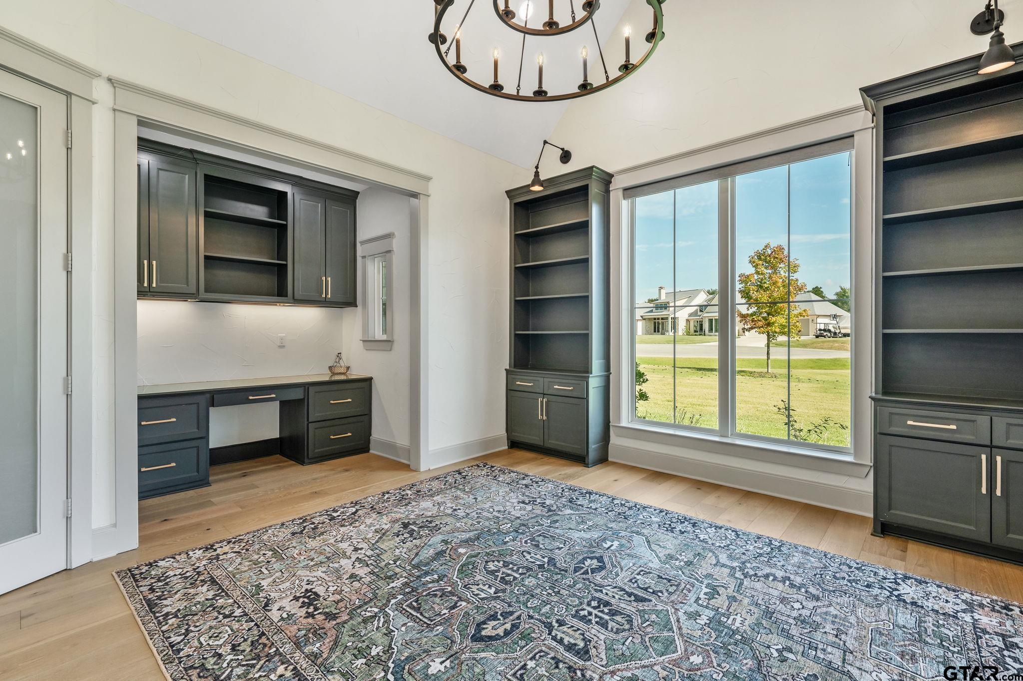 15601 Stampede Run Tyler, TX 75703 - Photo 29 of 48 a view of an empty room with a fireplace and a window