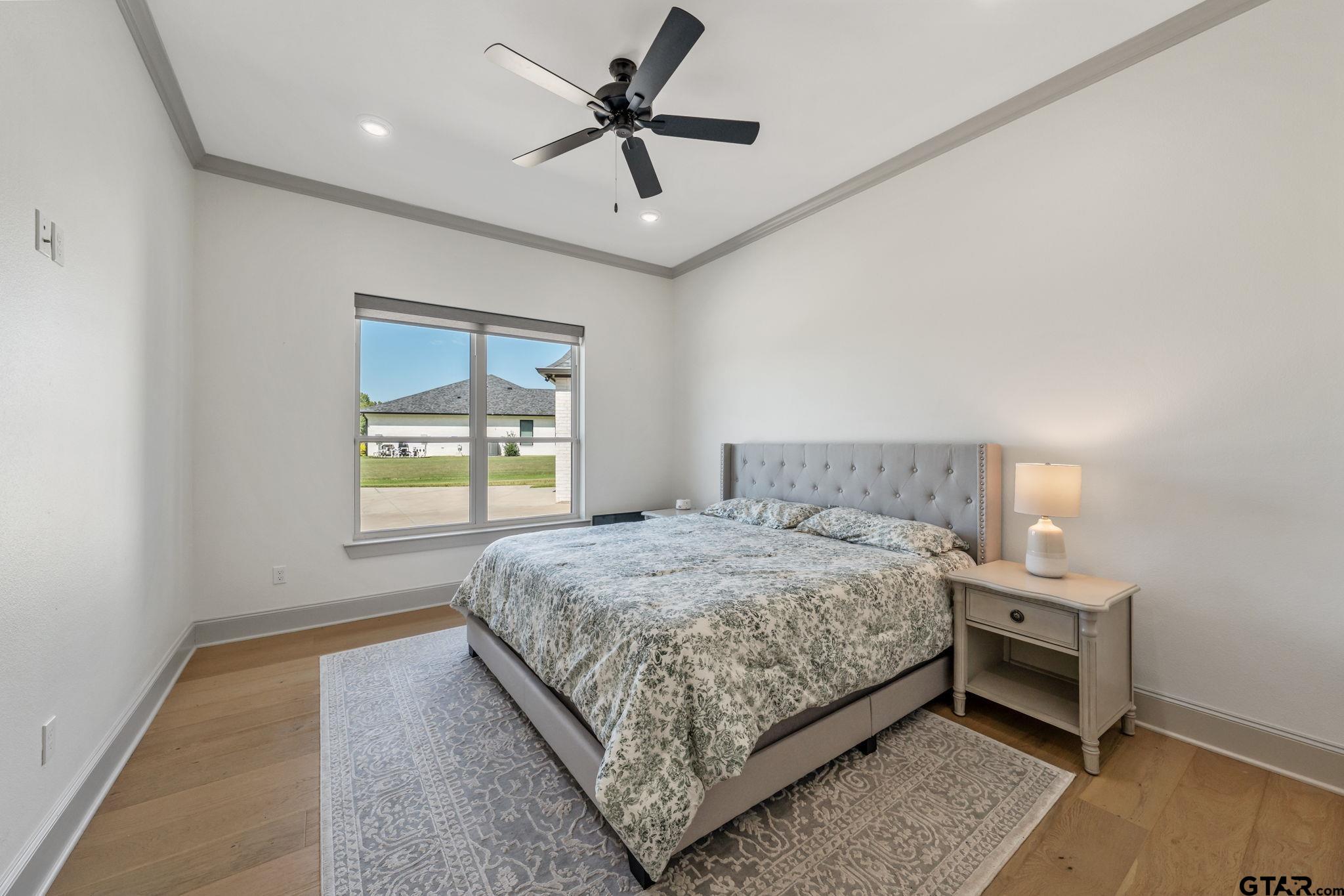 15601 Stampede Run Tyler, TX 75703 - Photo 38 of 48 a bedroom with a bed and a window