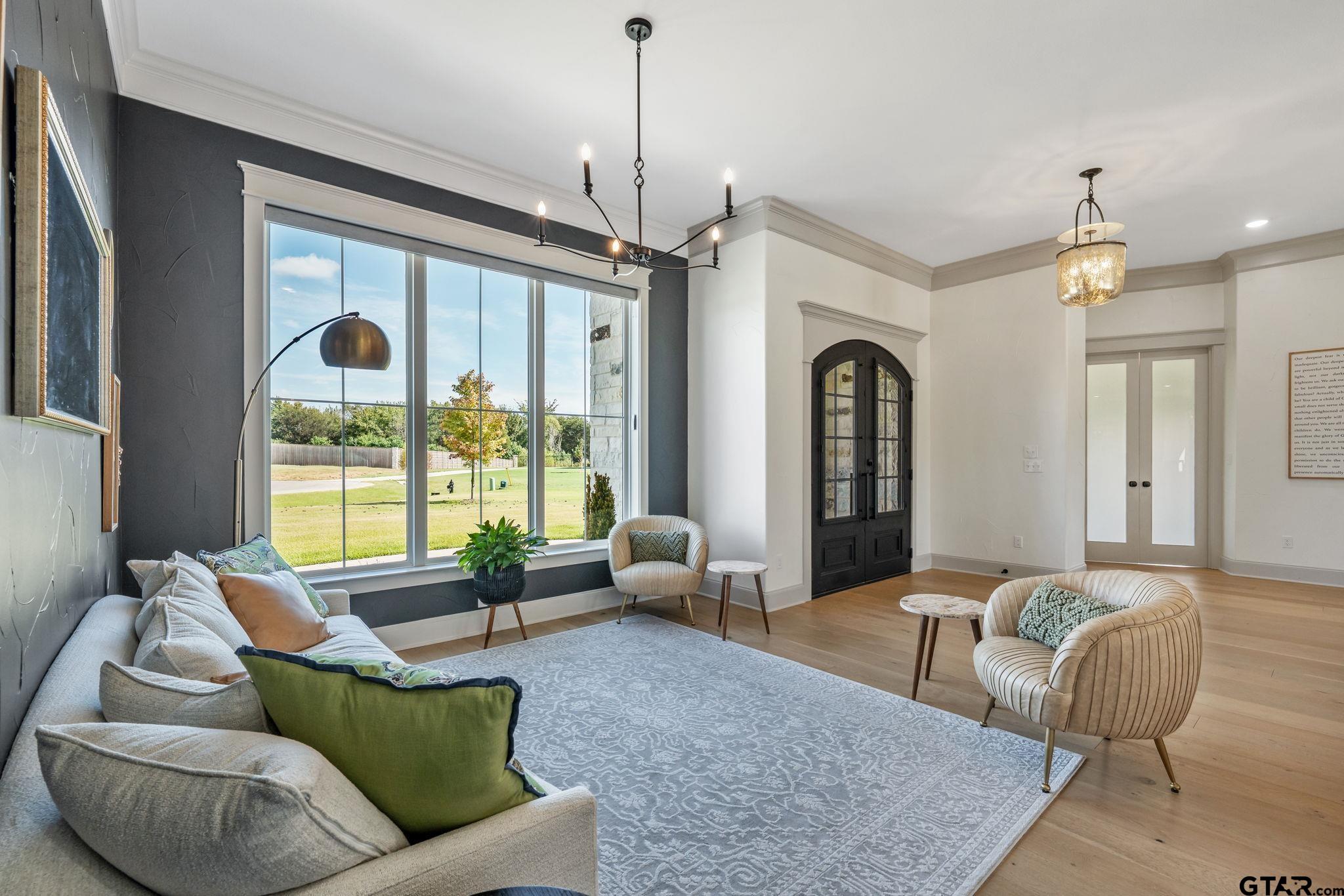 15601 Stampede Run Tyler, TX 75703 - Photo 10 of 48 a living room with furniture and a large window