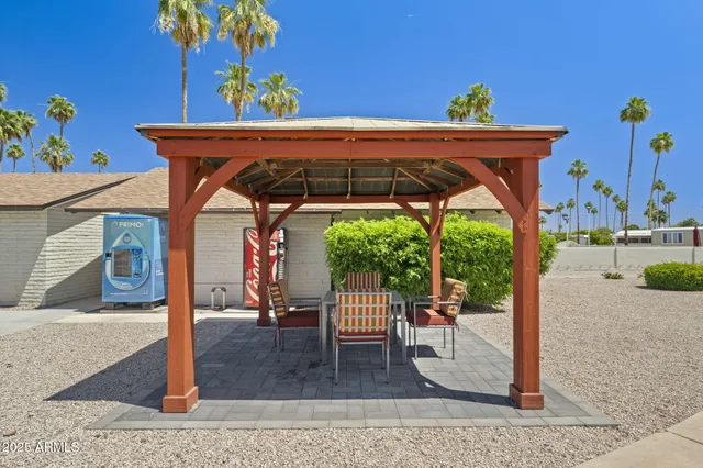 a view of a swimming pool with chairs