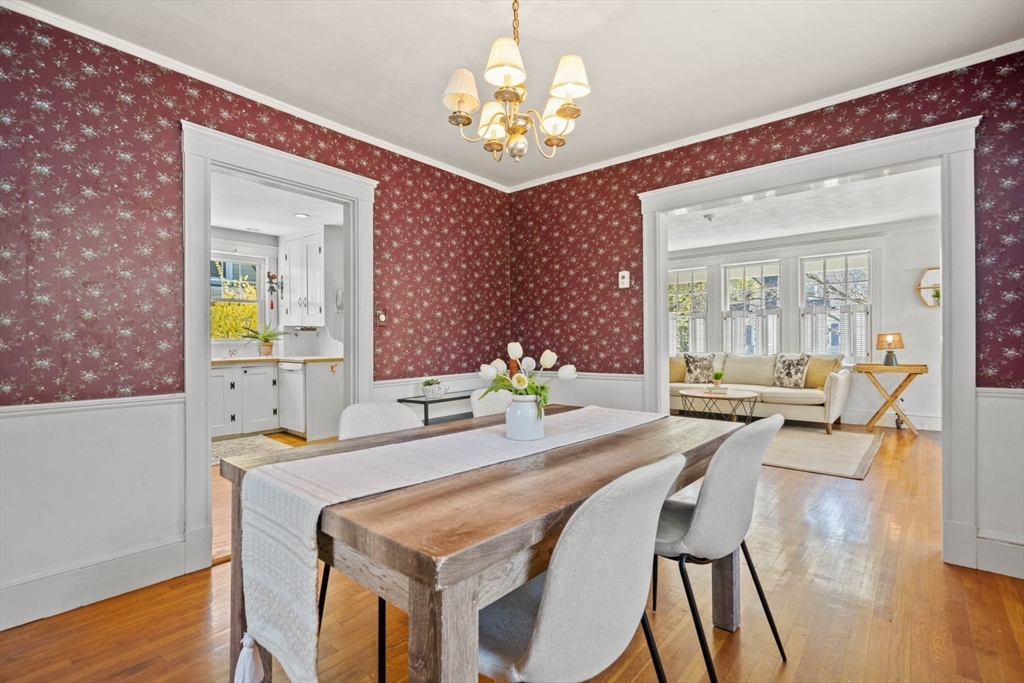 71 Woodside Road Winchester, MA 01890 - Photo 17 of 40 a view of a dining room with furniture and wooden floor