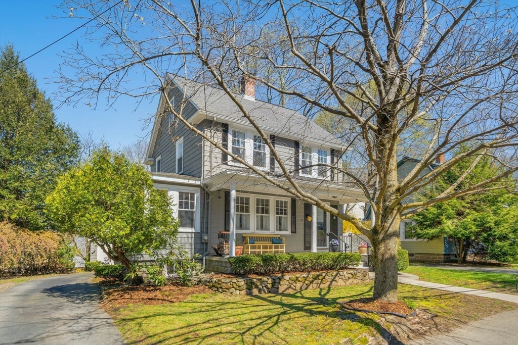 71 Woodside Road Winchester, MA 01890 - Photo 2 of 40 a front view of a house with a yard