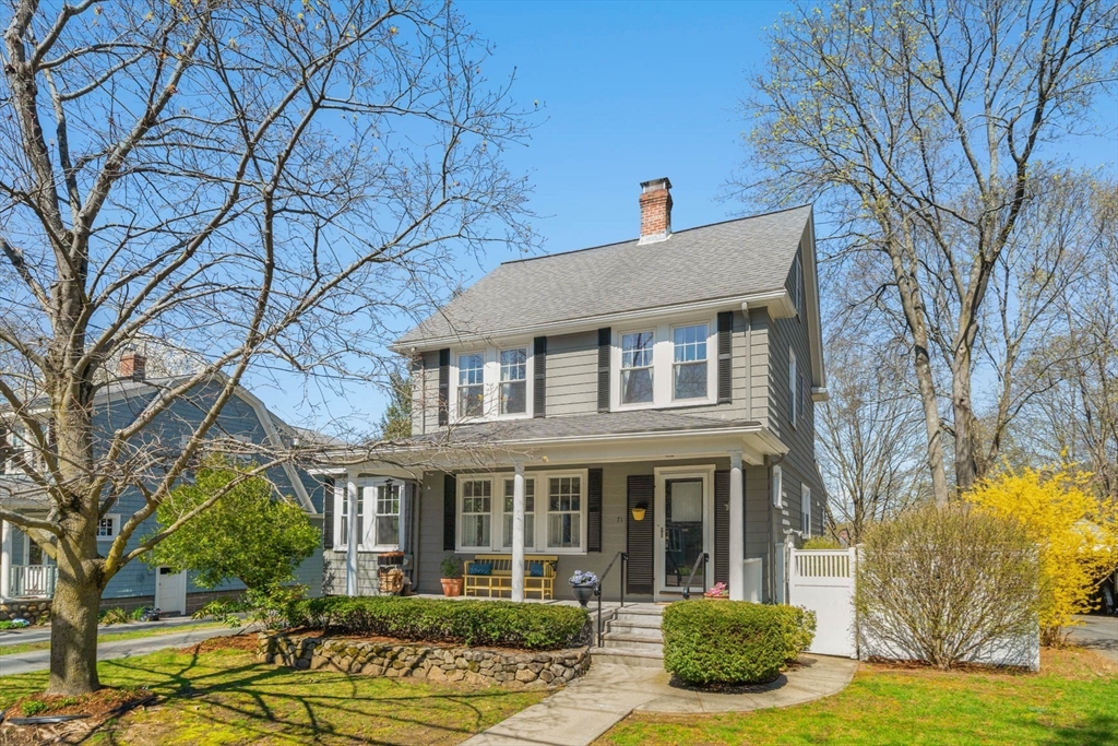 71 Woodside Road Winchester, MA 01890 - Photo 36 of 40 a front view of a house with garden
