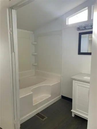 a bathroom with a bathtub