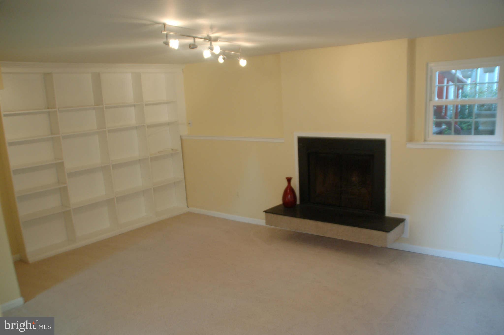 2420 Ridgehampton Court Reston, VA 20191 - Photo 11 of 16 a room with a fireplace