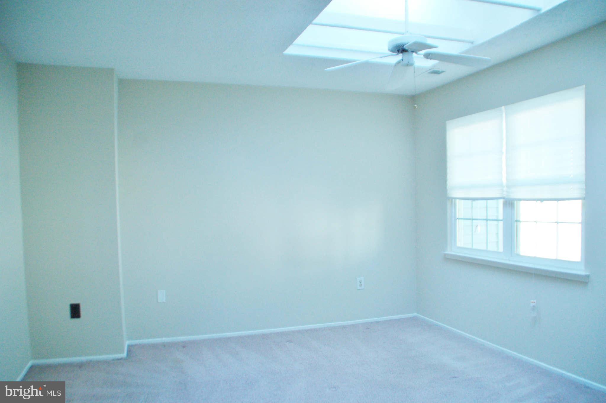 2420 Ridgehampton Court Reston, VA 20191 - Photo 9 of 16 an empty room with a window