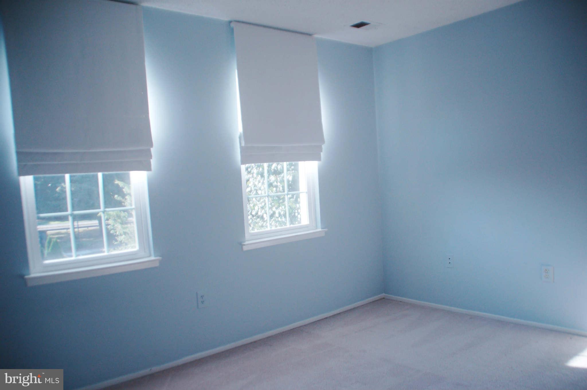 2420 Ridgehampton Court Reston, VA 20191 - Photo 10 of 16 an empty room with a window