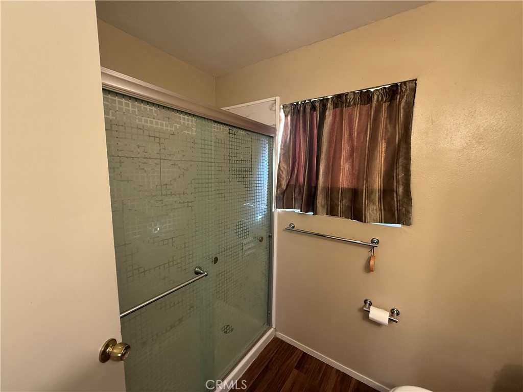243 Balboa Avenue Mojave, CA 93501 - Photo 34 of 75 a bathroom with a shower and a sink